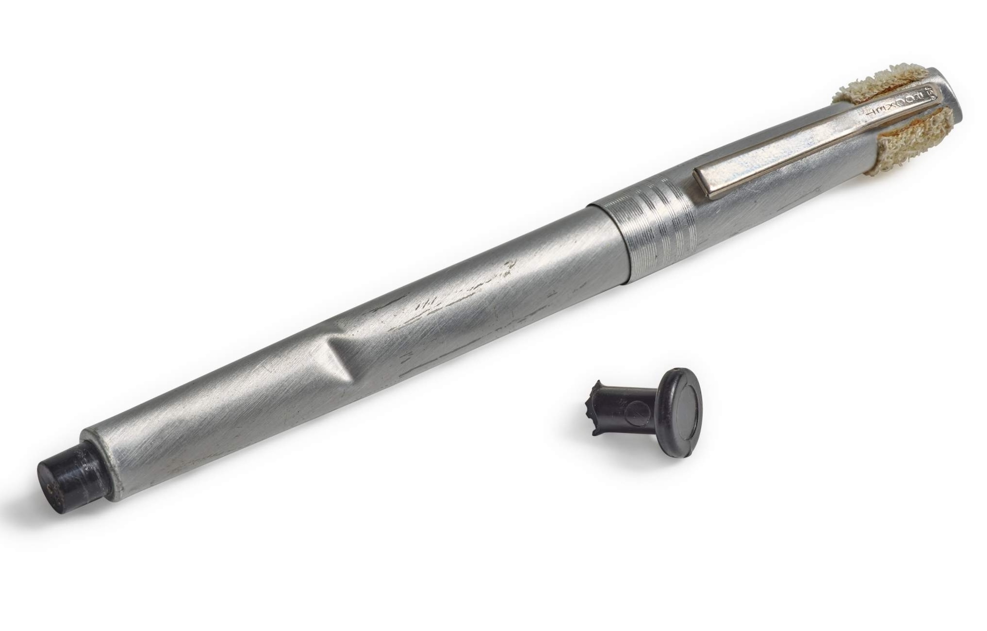The broken circuit breaker switch that nearly ended Apollo 11, and the pen that saved the crew and the mission. Photo: Courtesy of Sotheby’s