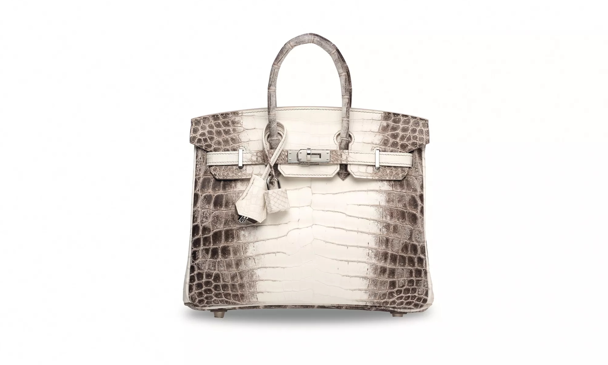 Hérmes, Matte White Himalaya Niloticus Crocodile Diamond Retourné Kelly 28 with 18K white gold and diamond hardware (2021). Photo: Courtesy of Christie’s Images Ltd.