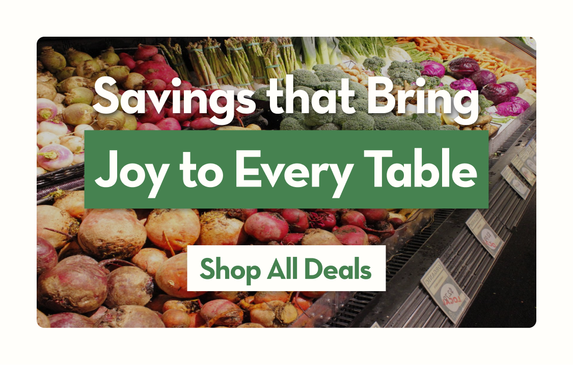 Banner with text Hand-Picked Savings, From Partners We Trust and a Shop Deals button over a background image of fresh produce.