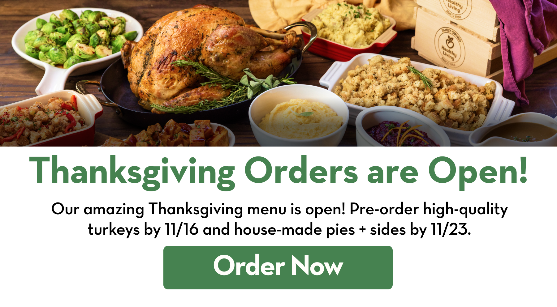 Spread of Thanksgiving turkey and side dishes on a table.