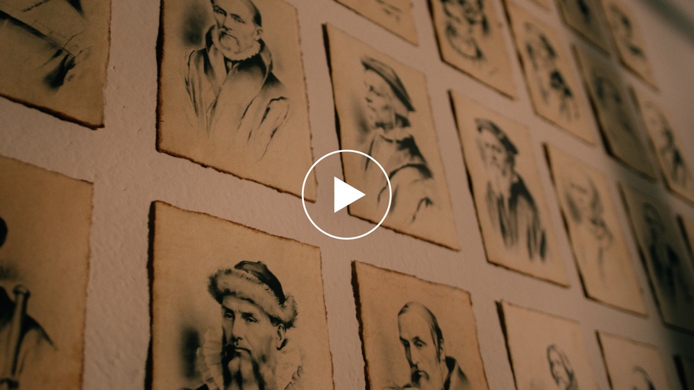 A picture of a wall of portraits depicting various men and women involved in the Protestant Reformation.