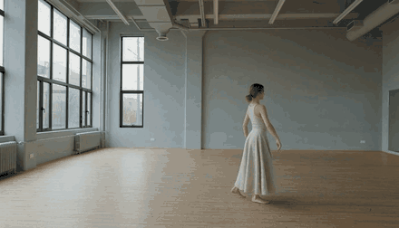 A dancer turning in a rehearsal studio, generated by HeyGen Video