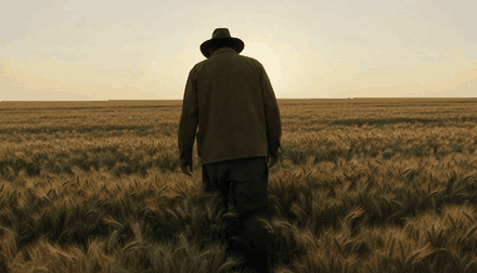 A farmer walking into a wheat field, generated by HeyGen Video