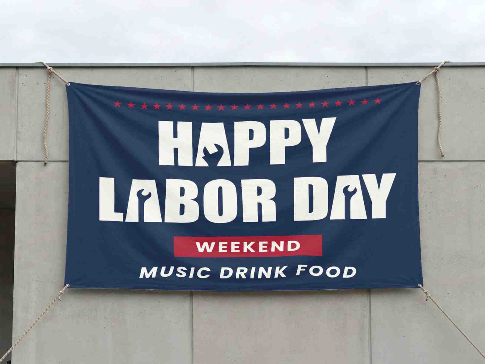 Large outdoor Labor Day weekend vinyl banner promoting live music, food, and drinks, securely mounted to a building wall for high-visibility event advertising.