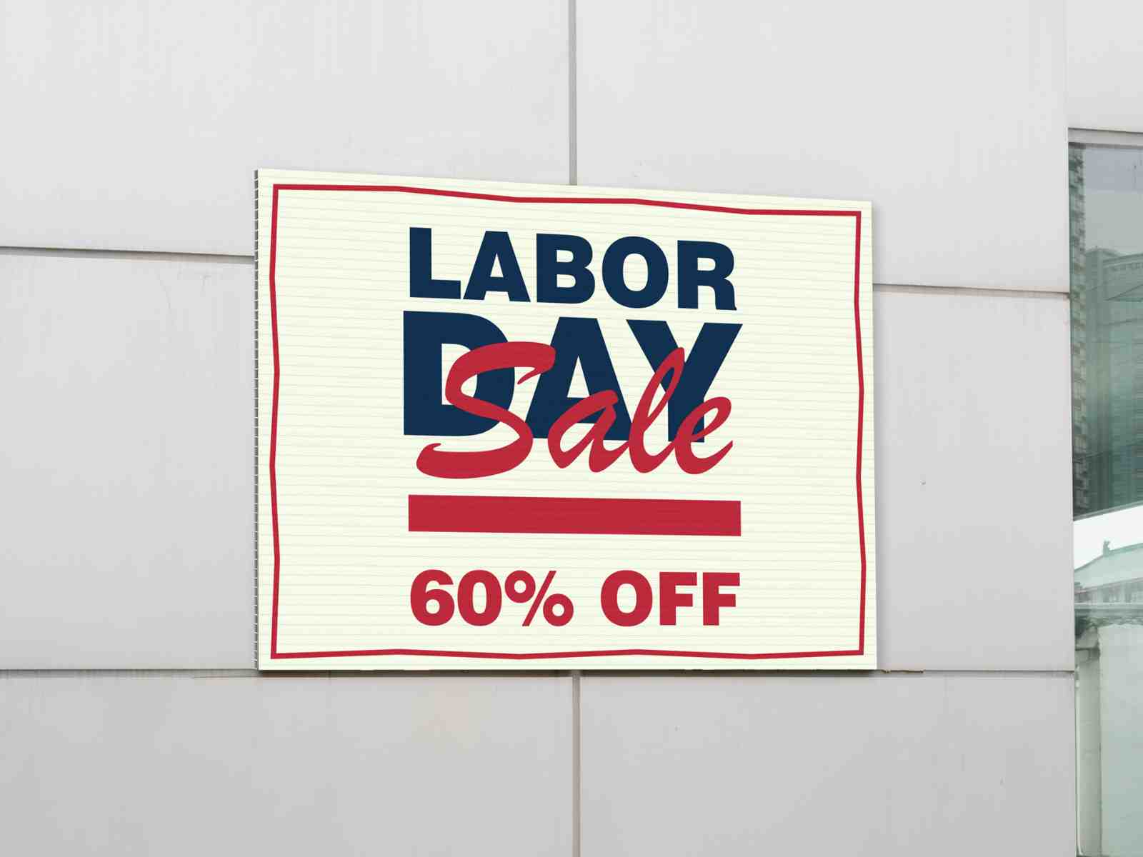 Corrugated plastic Labor Day sale sign mounted outdoors, promoting a 60% off holiday discount with weather-resistant, full-color graphics.