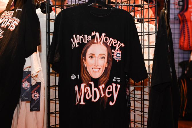 A shirt with an image of Connecticut Sun guard Marina Mabrey and