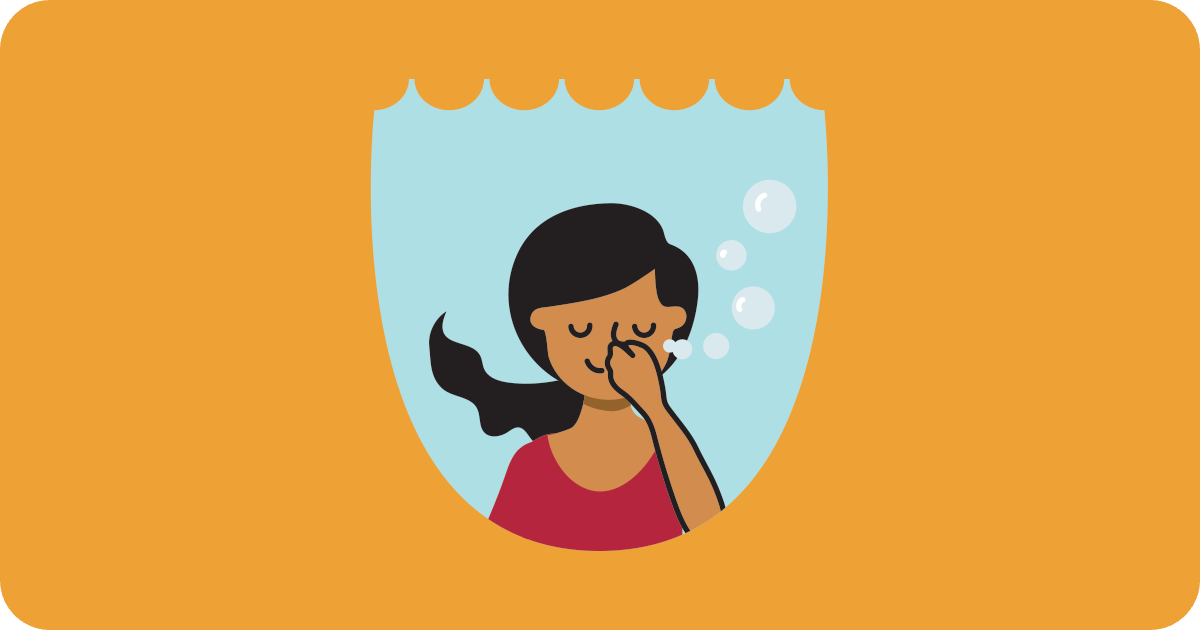 woman holding her breath under water