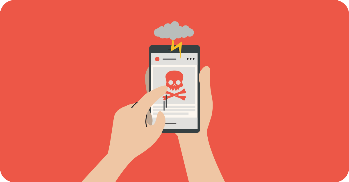 person scrolling on a phone with skull and crossbones