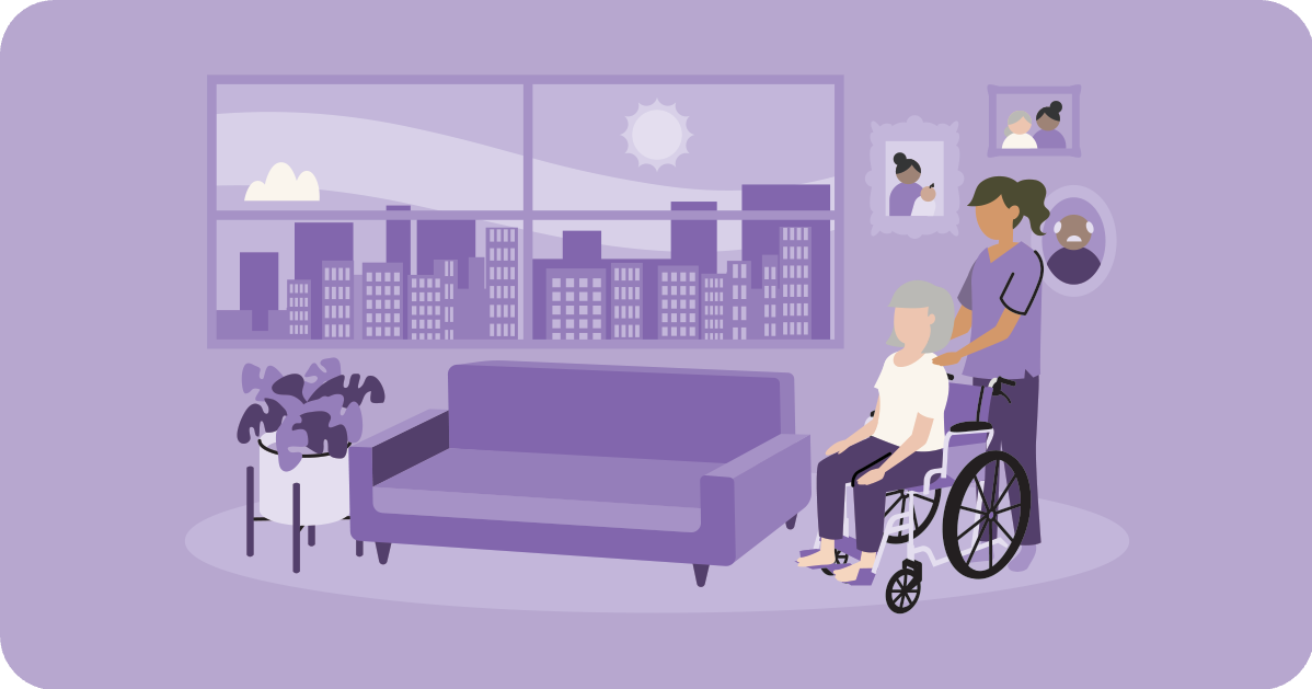 healthcare aide in home with patient in wheelchair 