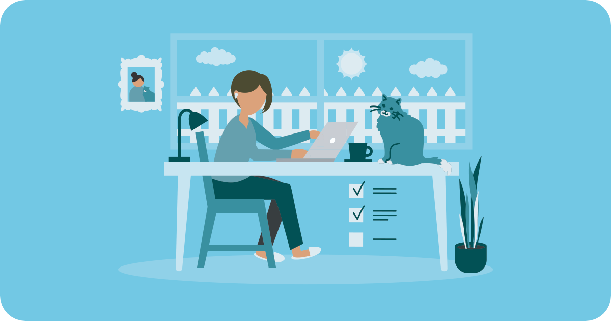 woman working online at home with cat on table