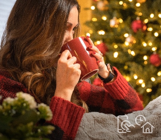 Image of a woman sipping from a mug