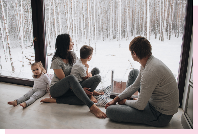 image of family cozy inside during winter